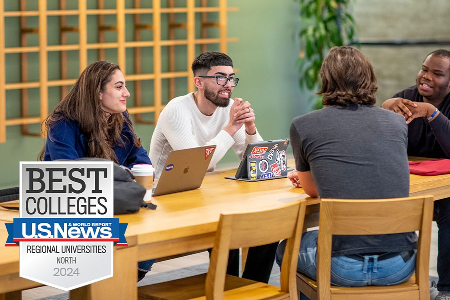 Diverse students talking at table mashed with U.S News & World Report rankings logo