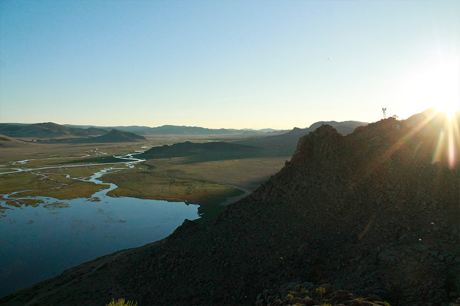 Mountain range with river and lake.