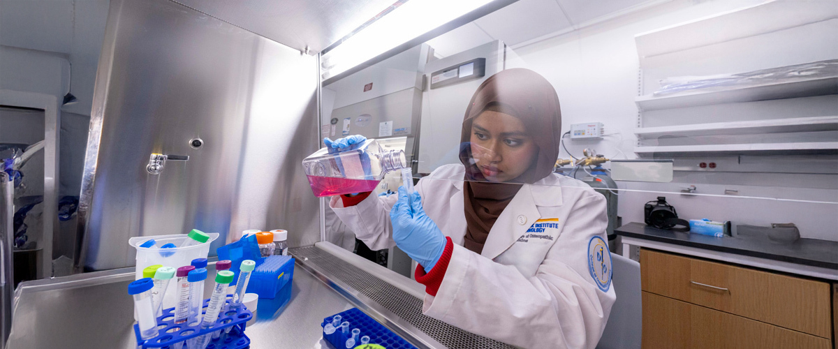A student works on a biomedical experiment in New York Tech's Biomedical Research, Innovation, and Imaging Center (BRIIC).