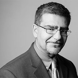 A portrait of Babak Beheshti.