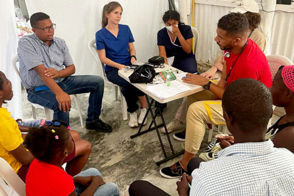 Students talking in a group.