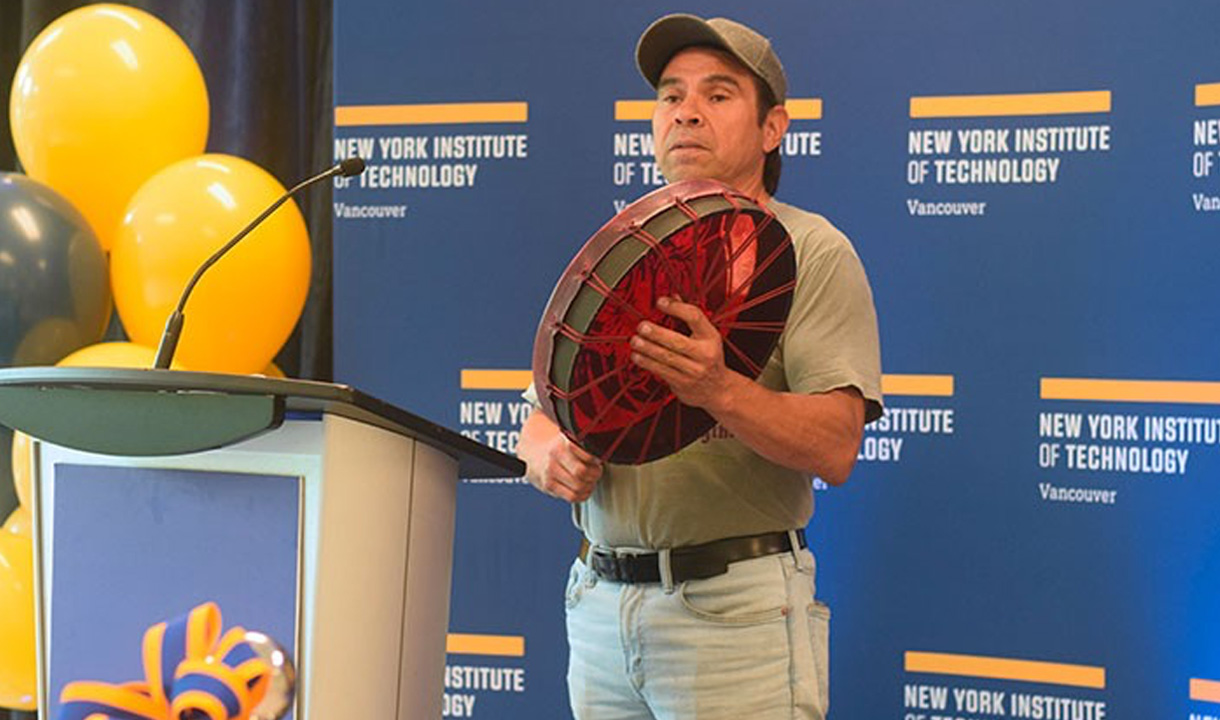 John Spence, a carver from the Coast Salish People of the Squamish Nation, delivered the land acknowledgment.