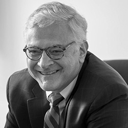 A portrait of Hank Foley.