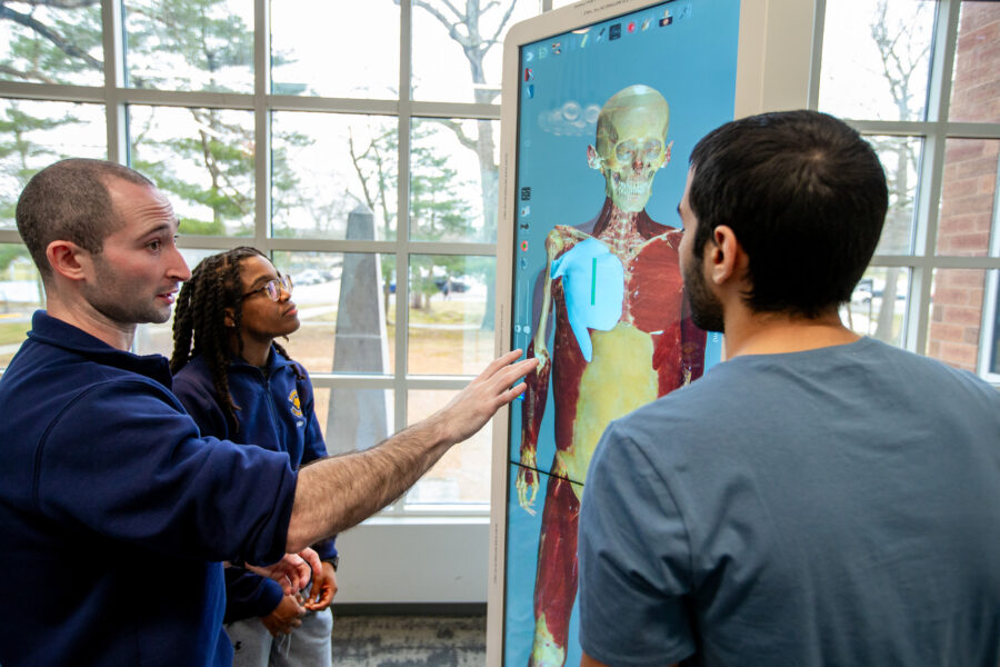 Professor and students using the Anomatage