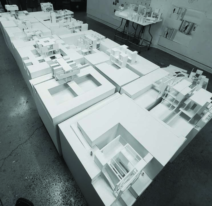 An architectural photo of a model of rectilinear structures.