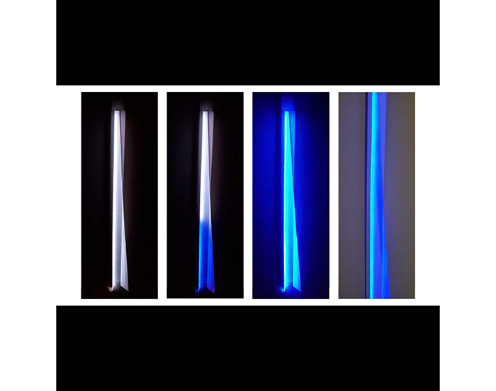 Four images of a vertical LED lighting display