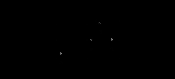 An animation showing emanation in white and light grey dots on a dark grey background in a black frame.