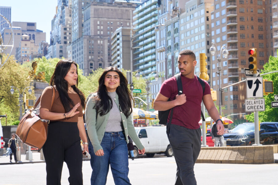 Group of students walking on the New York City campus