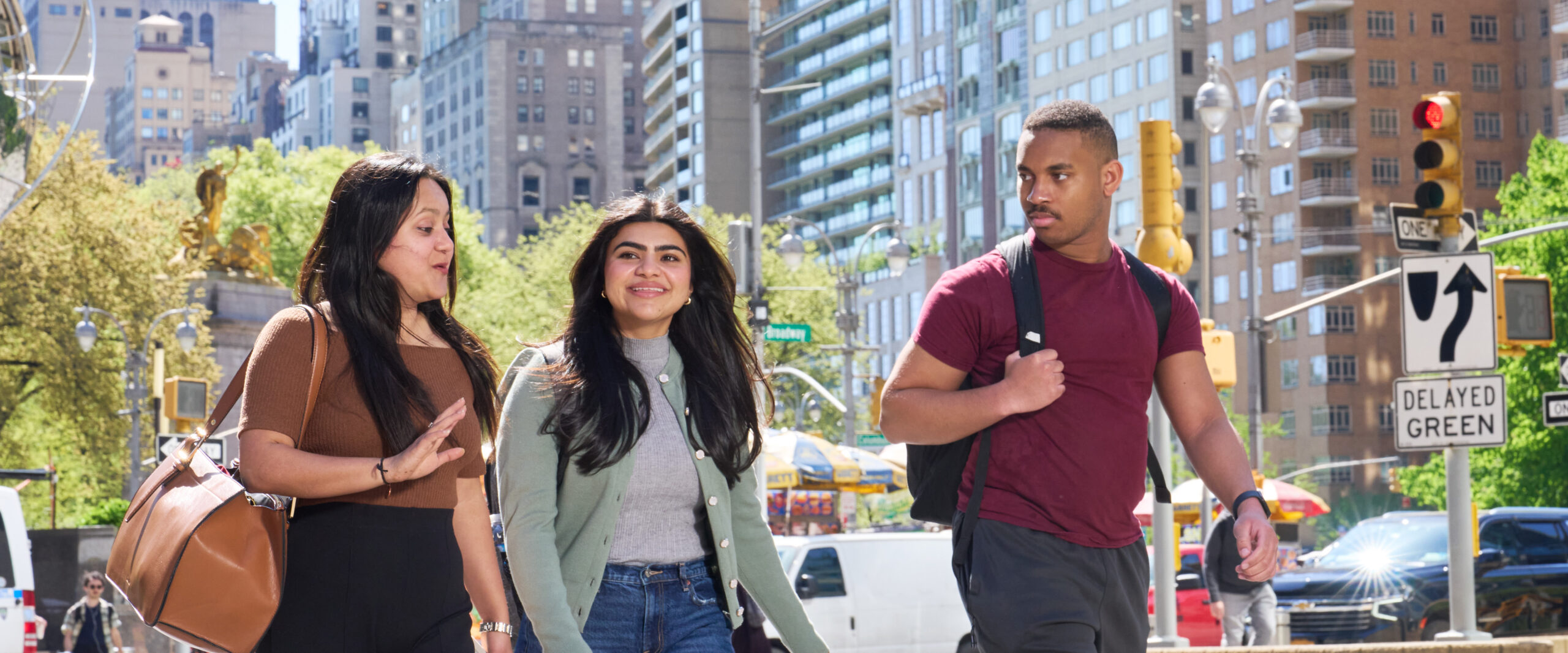 Group of students walking on the New York City campus
