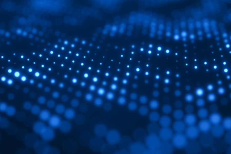 A grid of illuminated lights. Some are blurred.