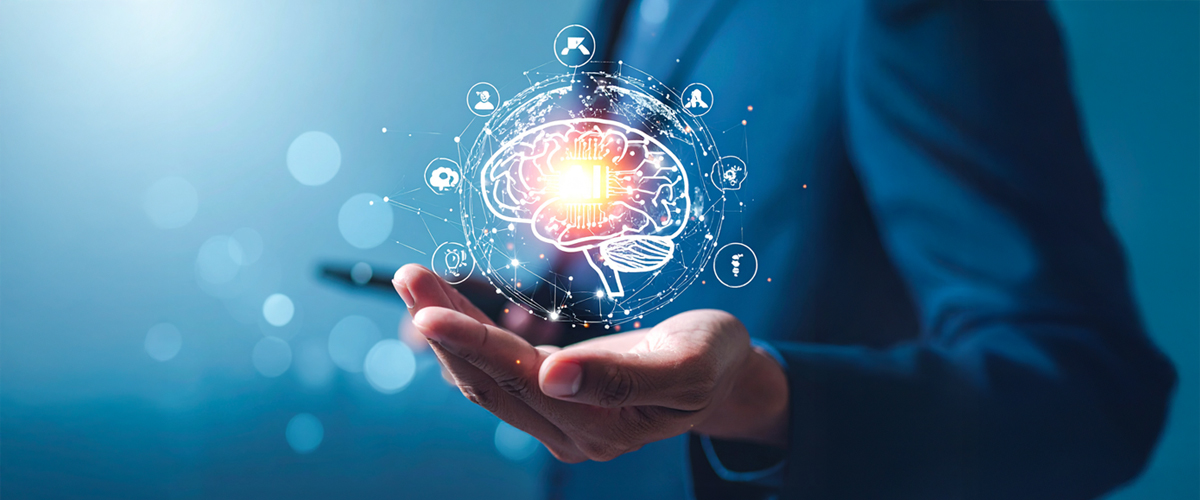 A hand holding a brain diagram with smaller elements floating around it