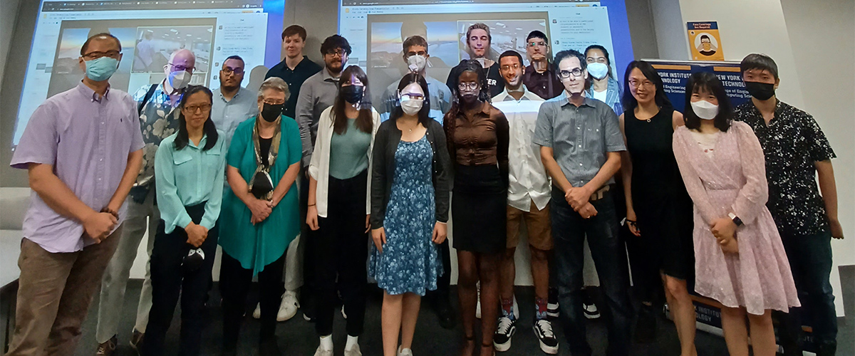 Group of REU students in front of presentation