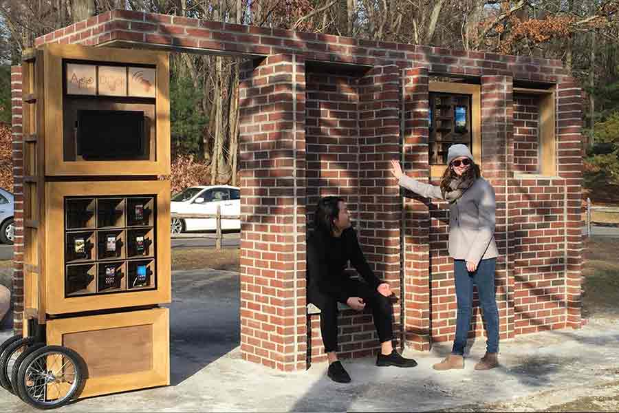 pop up work show made of brick material, wood, and glass