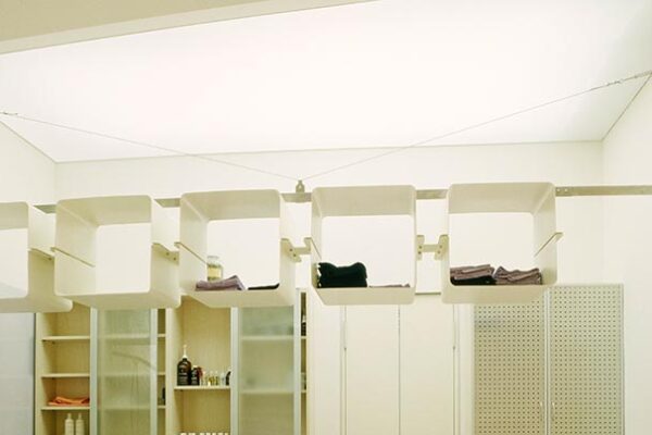 Furniture Design in Metal as Suspended Shelving Unit of Hair Salon in Verona, Italy