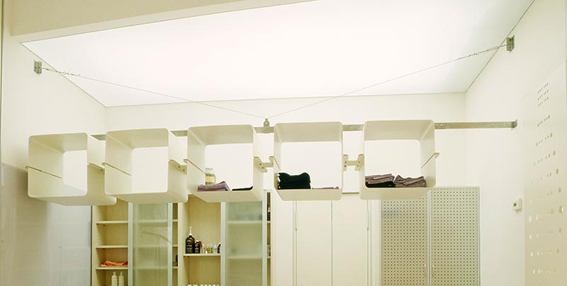 Furniture Design in Metal as Suspended Shelving Unit of Hair Salon in Verona, Italy