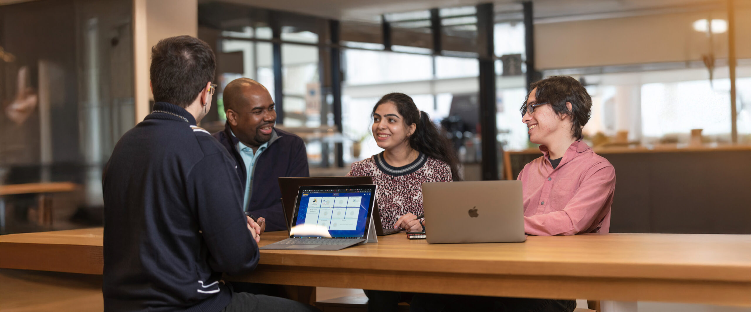 People sitting around a table talking