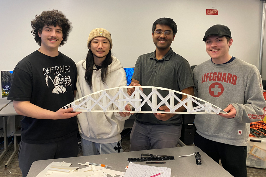 Students holding bridge