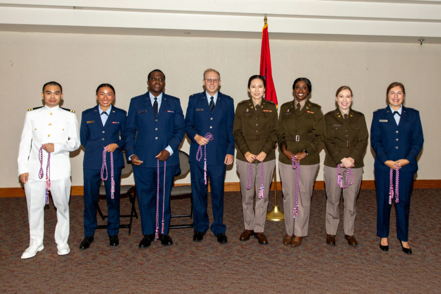 Group of NYITCOM-Arkansas graduates in military uniform