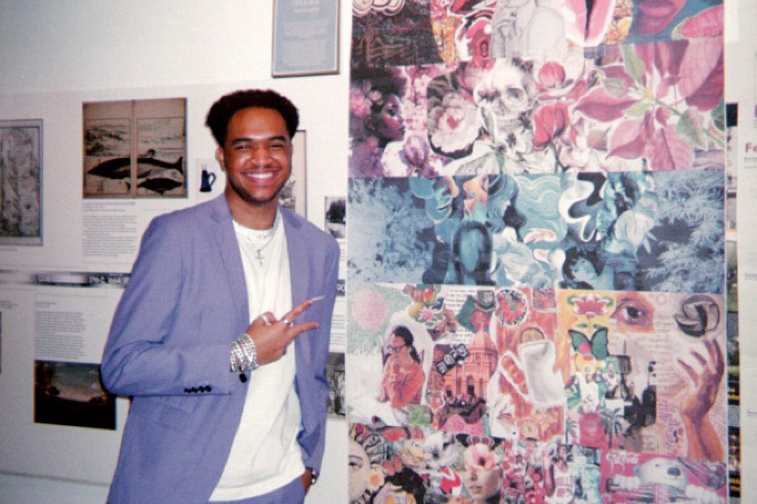 Taesean Austin standing next to a mural