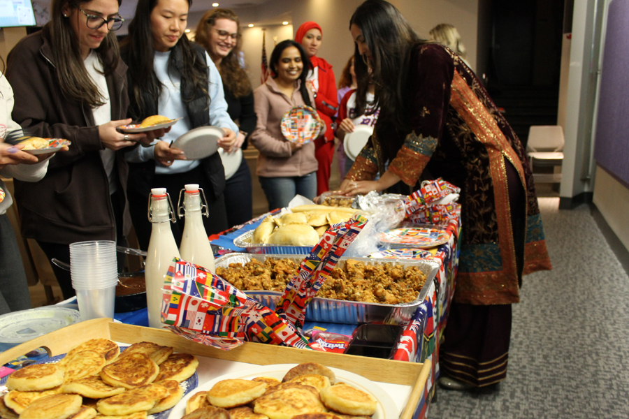 Students lined up at a buffet table