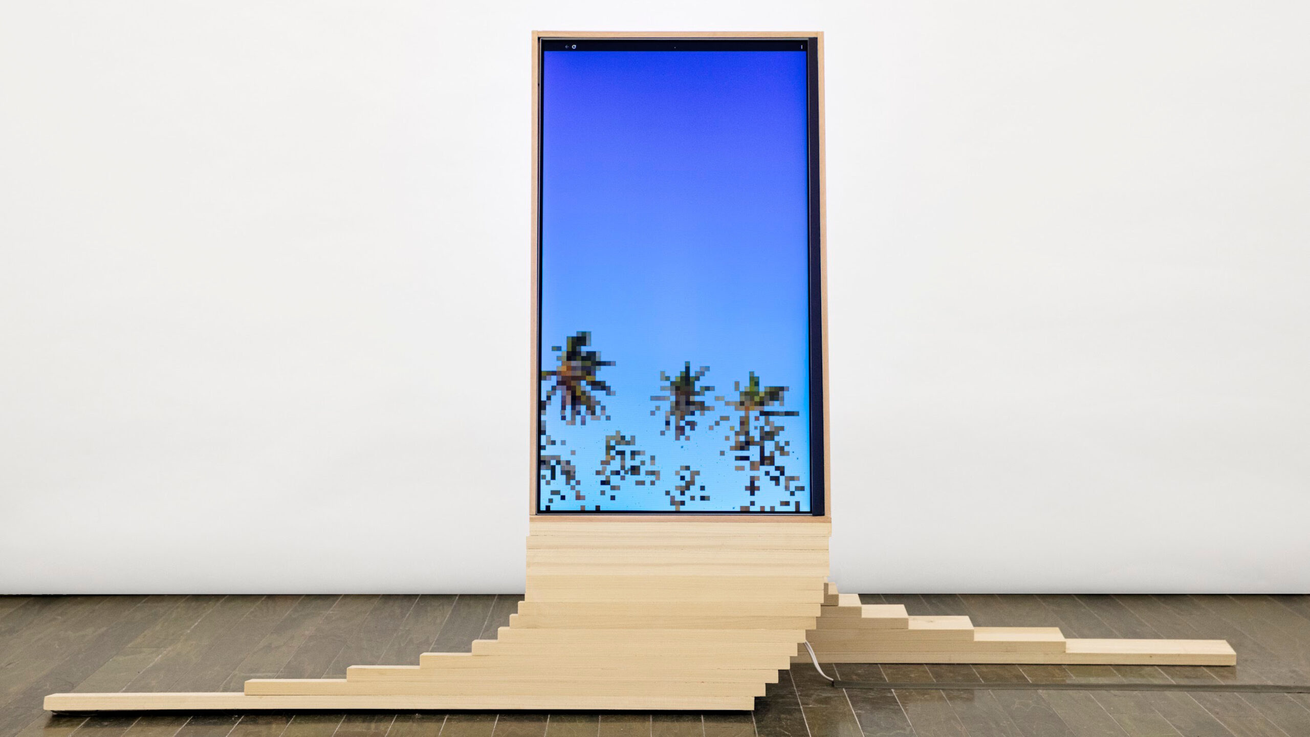 Pixelated palm trees on a computer screen