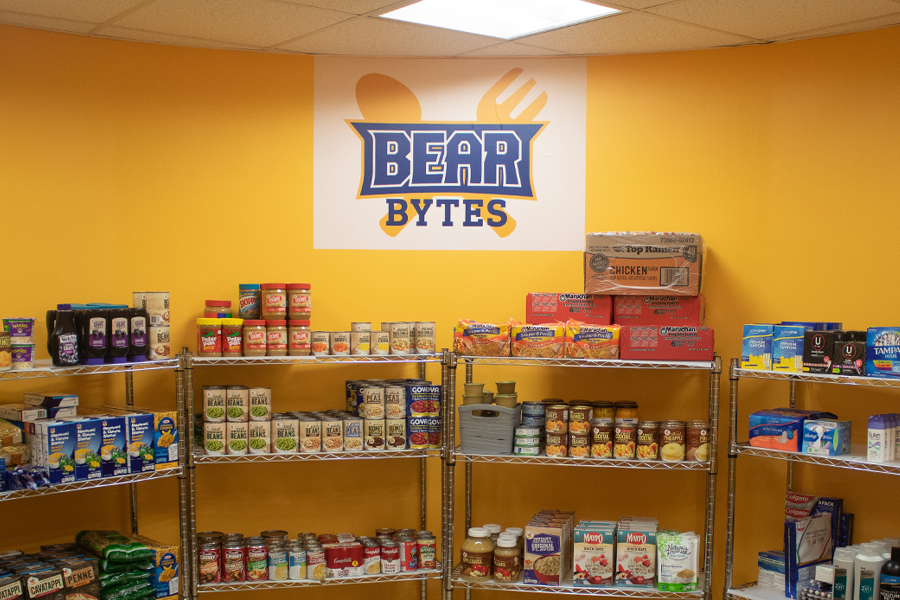 Canned goods on shelves with Bear Bytes sign above
