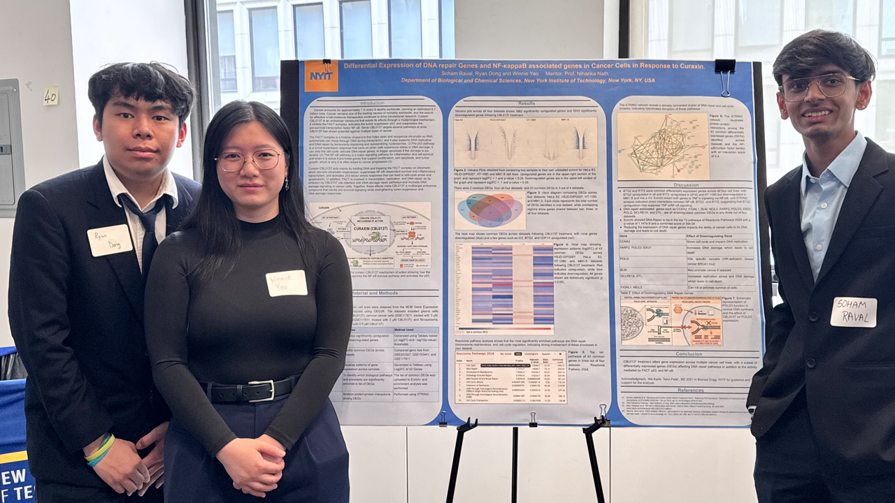 Ryan Dong, Winnie Yao, and Soham Raval standing by their poster