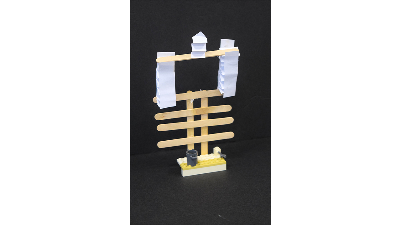Lego, popsicle sticks, glue, paper