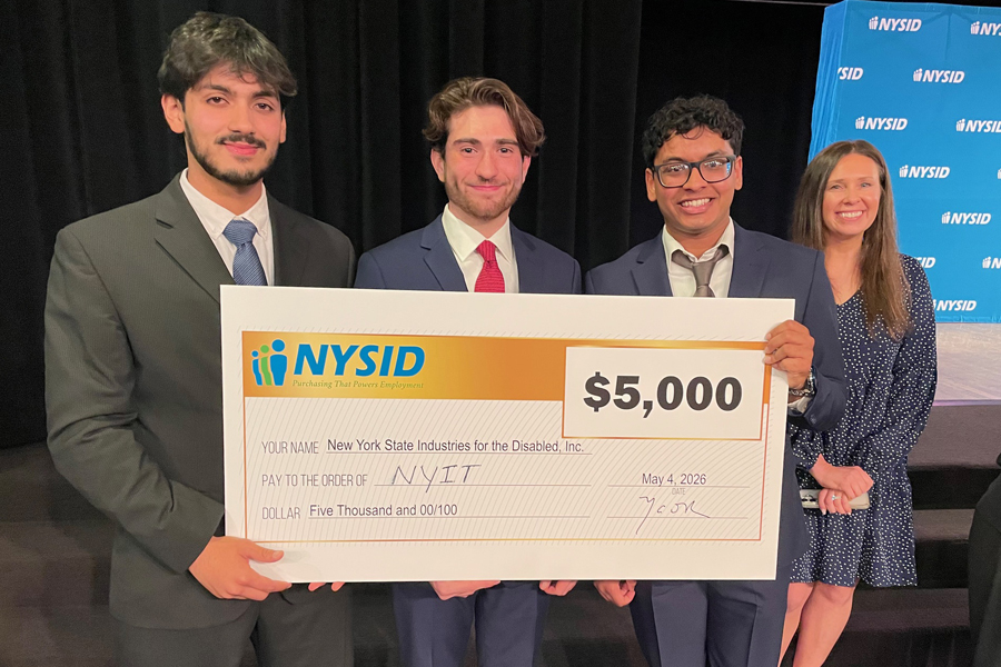 Students holding monetary award