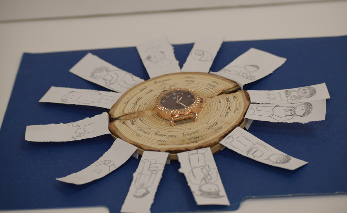 Wood, watch, paper, pencil