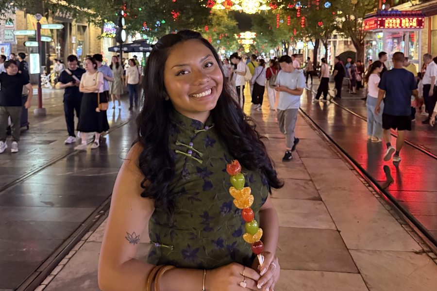 Natalie Corella standing in a pedestrian zone