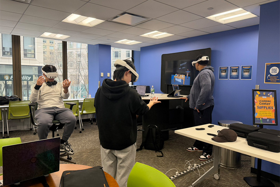 Students in a classroom using virtual reality headsets