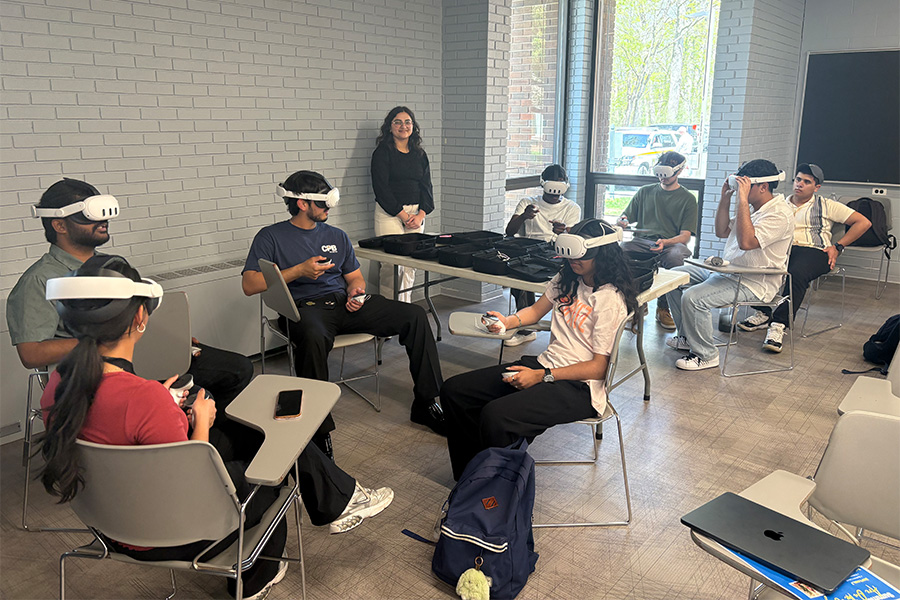 Students in a classroom using virtual reality headsets