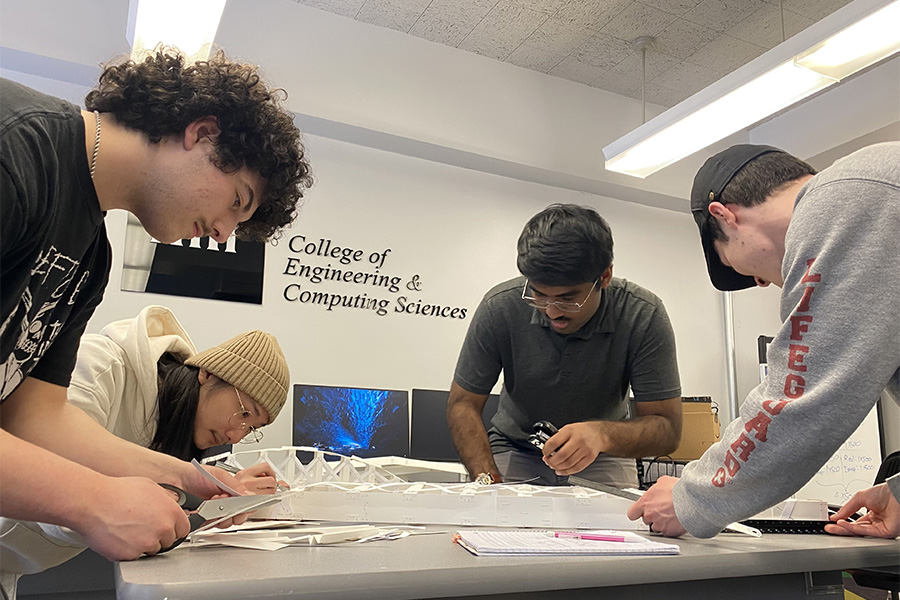 Students working at a large table