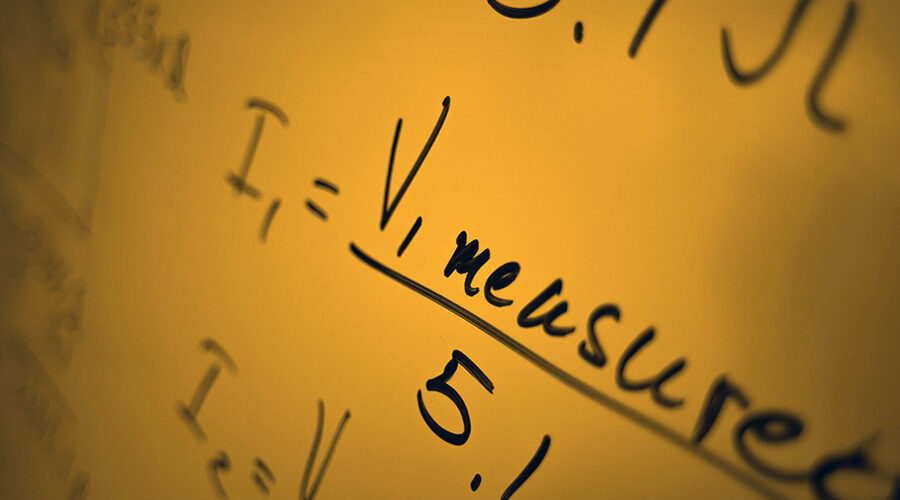 Math equations on a white board.