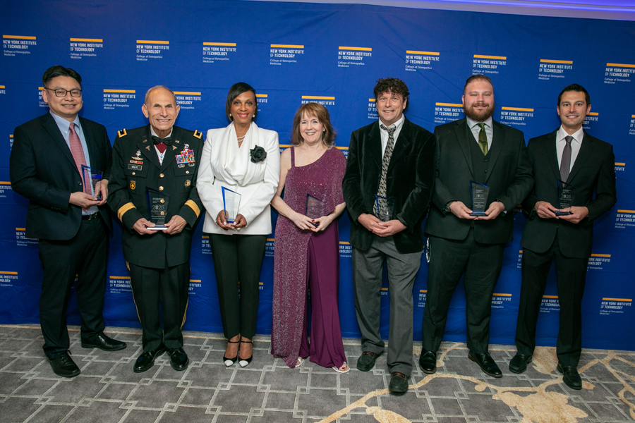Honorees holding awards