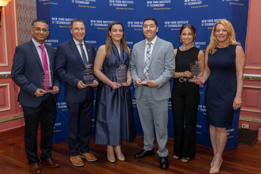 Group of honorees holding awards