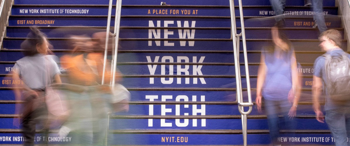 New York Tech ad written on the stairs in a New York City subway station